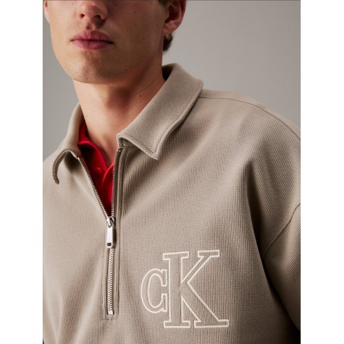  Rib Knit Logo Applique Zip Polo